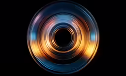 a dark background with light reflecting in the circular image