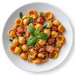 an aerial view of pasta with meat and vegetables