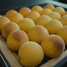 there are freshly baked balls in a tray