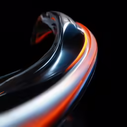 a photograph of a shiny red and grey object