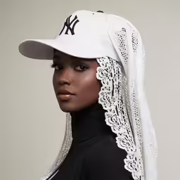 a woman with a white hat on top of her head