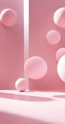 a bunch of balloons flying around in the air