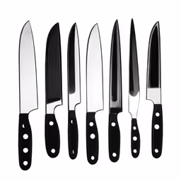a group of knives sitting next to each other