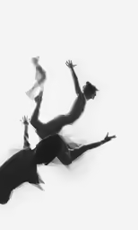silhouette of women with legs spread out in water
