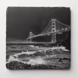 black and white photograph of the golden gate bridge from a rocky shore
