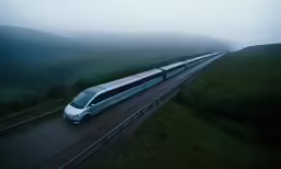 a long white train on a rail road