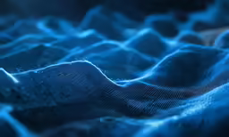 blue waves and the light is shining on them