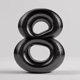 black art object placed on white background