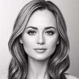 a woman with long hair in black and white photo