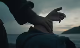 someone points their finger at something that looks like a hand