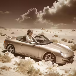 woman driving car through barren land area in desert