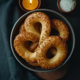 an image of three pretzel bites being eaten