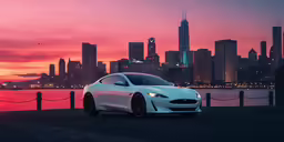 the white car parked at dusk near the water