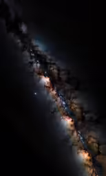 a spiral galaxy with many stars in the sky
