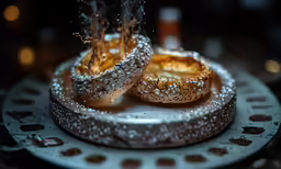 some food is sitting on top of a cake