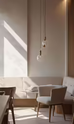 light fixtures hanging from the ceiling in a white living room