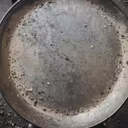 a black frying pan full of black stuff