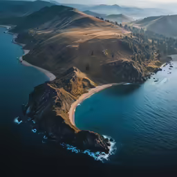 the mountains are shown near a beach and ocean