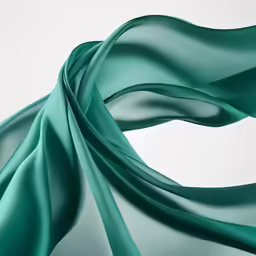 an abstract image of green wavy cloth blowing