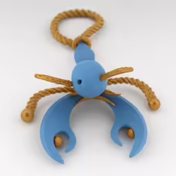 a blue crab made out of rope is sitting on a white surface