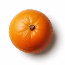 a whole orange sitting up against a white background