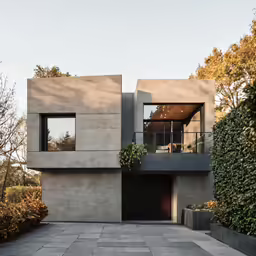 a modern house has been renovated with concrete