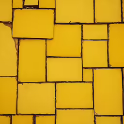 a close up shot of a tile wall made of squares