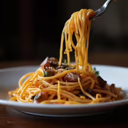 a close up of food on a plate with a fork