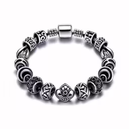 a 929 silver plated bracelet with beads on it,a black and white charm bracelet with silver beads