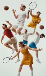 a man and a woman all holding tennis racquets