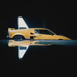 an old yellow car parked in the dark