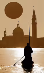 a man in a canoe is floating towards a building