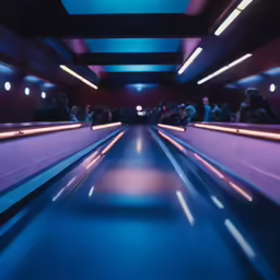a long conveyor belt in a brightly lit building