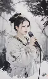 an asian woman in the snow with a microphone