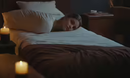 there is a woman that is sleeping in the bed