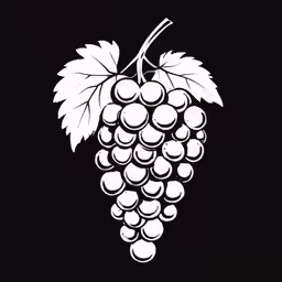 a bunch of grapes with leaf on it