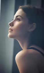 the head and shoulder of a young woman in profile