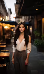 a woman posing in front of the camera at night