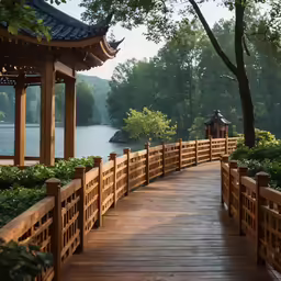 this is a boardwalk in a park near a lake