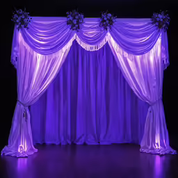 purple stage curtains in the dark with flowers