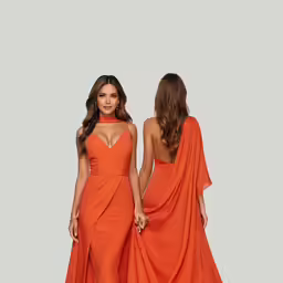 two woman dressed in orange dresses with capes on