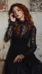 a woman wearing a dress and a cellphone