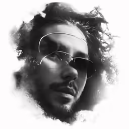 a male with glasses on with an ink painting