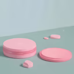 a compact container with a lid sits on top of the table next to a smaller pink box