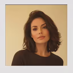 a woman is posing for a photo wearing a brown top