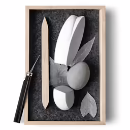 a picture with a cutting board and scissors