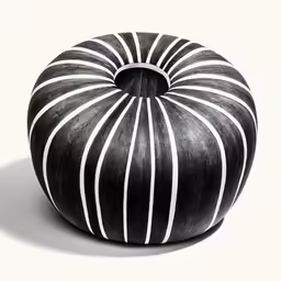 an oddly shaped object is shown with black and white stripes