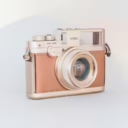 an antique camera with leather case is shown