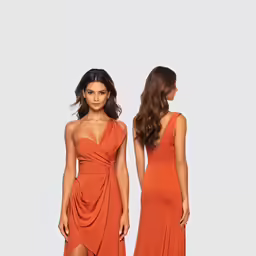 two women in orange dresses standing side by side