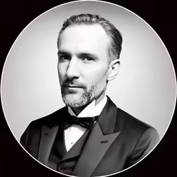 a man with a beard in a black suit